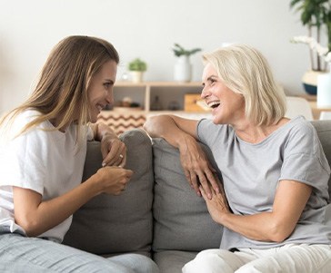Ladies converse on couch