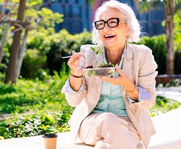 Lady enjoys salad