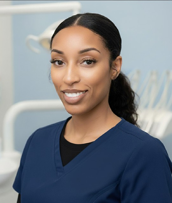 Dentist showing patient X-ray of their teeth